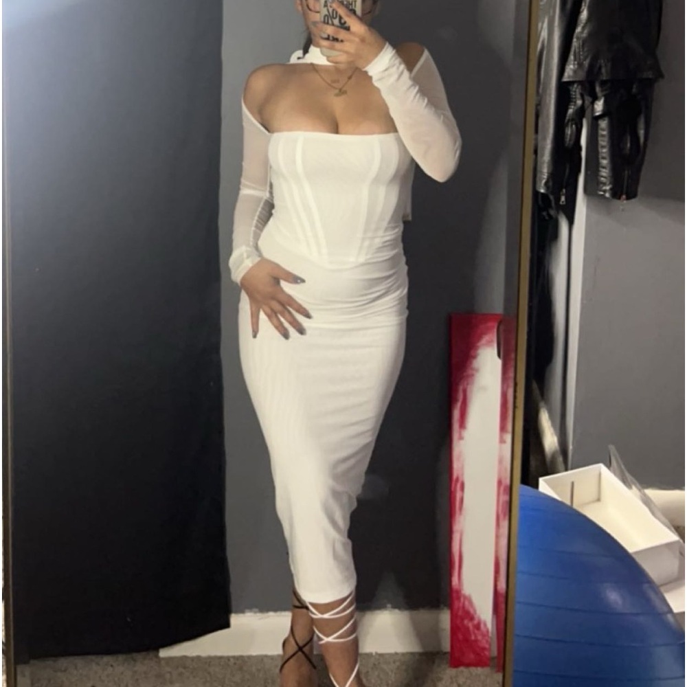 white, fit to body and stretchy